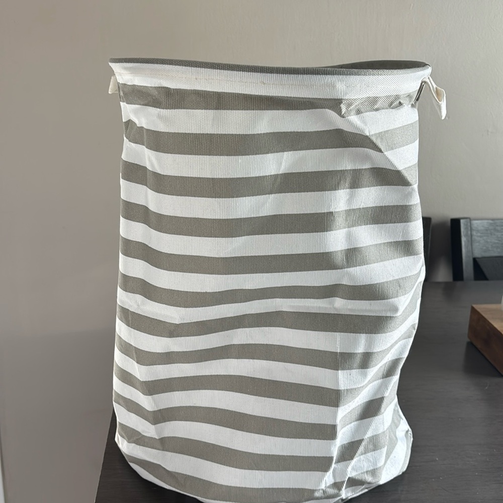 NWOT gray and white striped clothes hamper